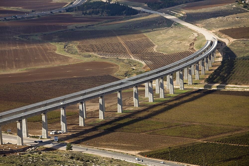 Aerial photograph of a massive Train bridge in the Plain, Israel