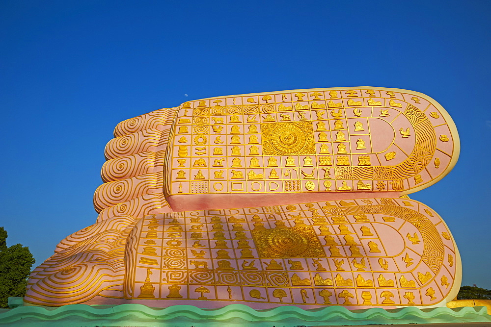 The decorated feet of the Mya Tha Lyaung reclining Buddha one of the largest in the world, Bago (Pegu), Myanmar (Burma), Asia