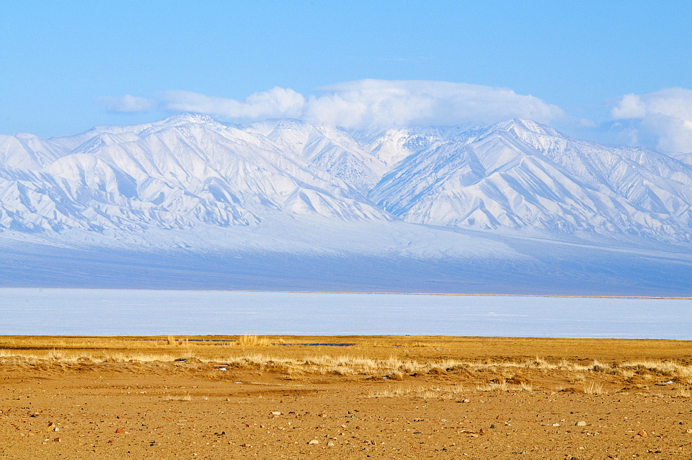 Winter landscape in Biosphere reserve with snow covered mountains, Lake Khar Us Nuur, Province of Khovd, Mongolia, Central Asia, Asia