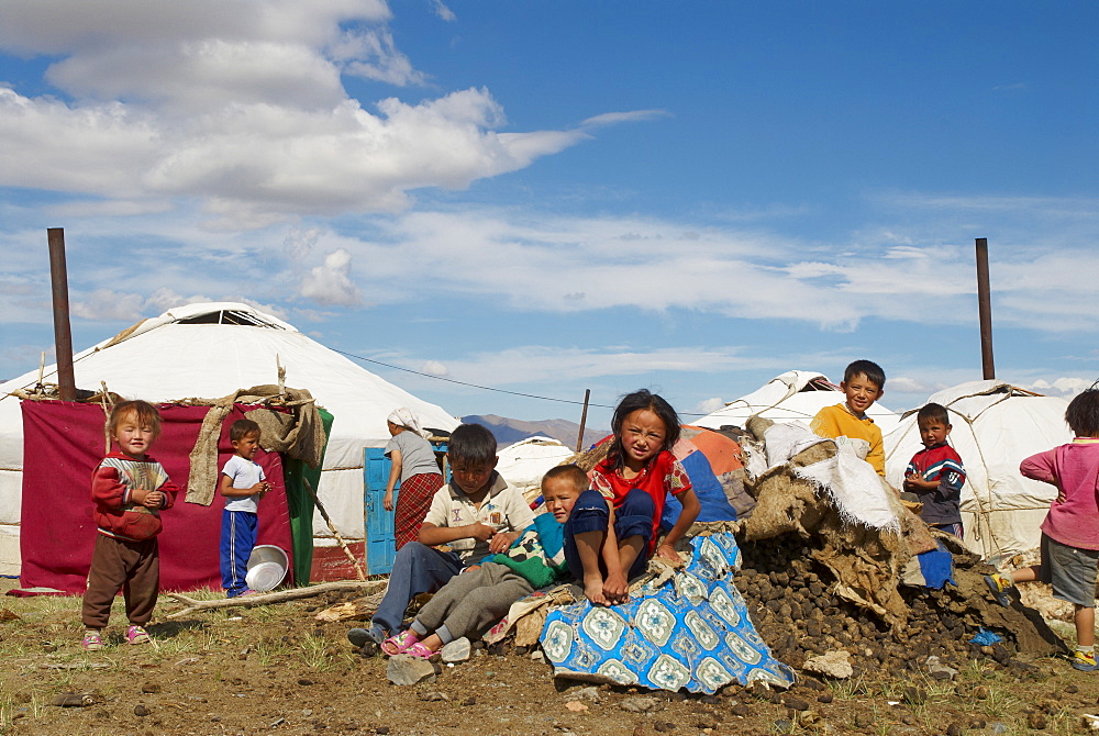 Nomadic Kazakh children and yurts, Region of Bayan Ulgii, Mongolia, Central Asia, Asia