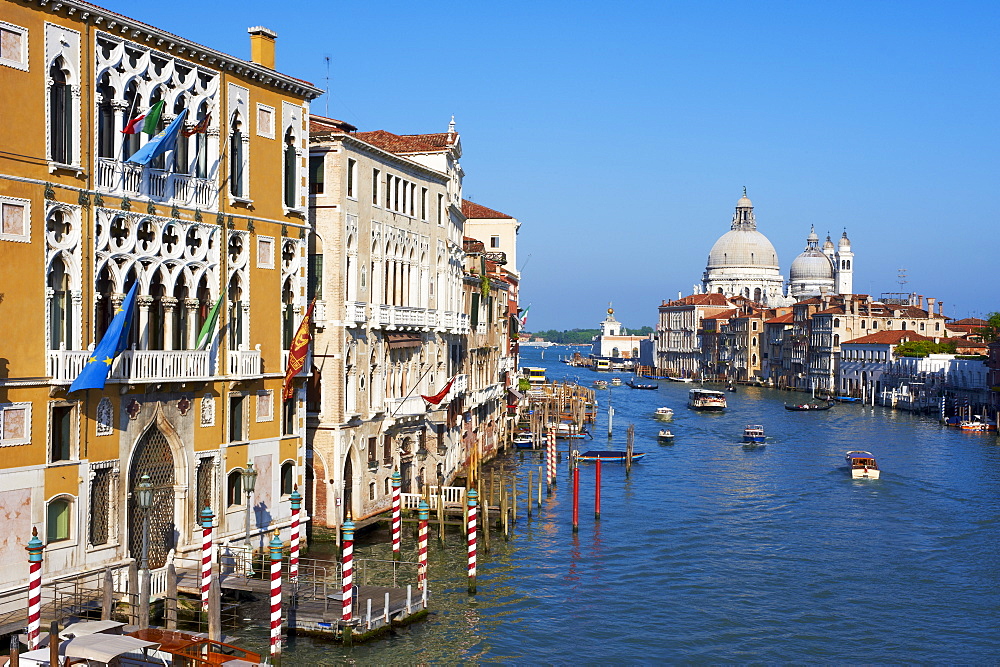 The Grand Canal and the Church of Santa Maria della Salute in the distance, viewed from the Academia Bridge, Venice, UNESCO World Heritage Site, Veneto, Italy, Europe