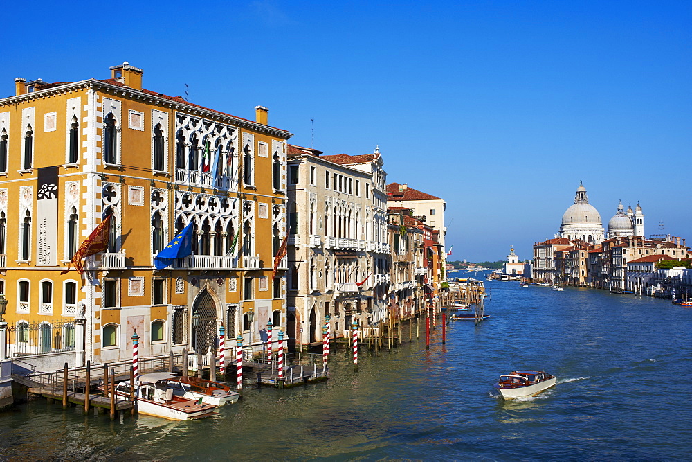 The Grand Canal and the Church of Santa Maria della Salute in the distance, viewed from the Academia Bridge, Venice, UNESCO World Heritage Site, Veneto, Italy, Europe