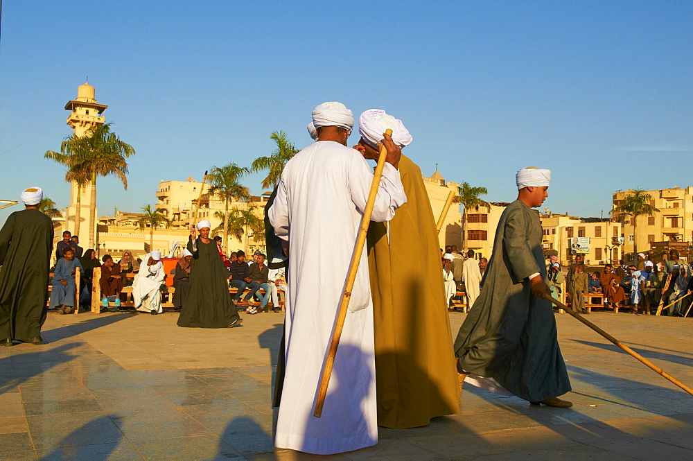 Tahtib demonstration, traditional form of Egyptian folk dance involving a wooden stick, also known as stick dance or cane dance, Mosque of Abu el-Haggag, Luxor, Egypt, North Africa, Africa