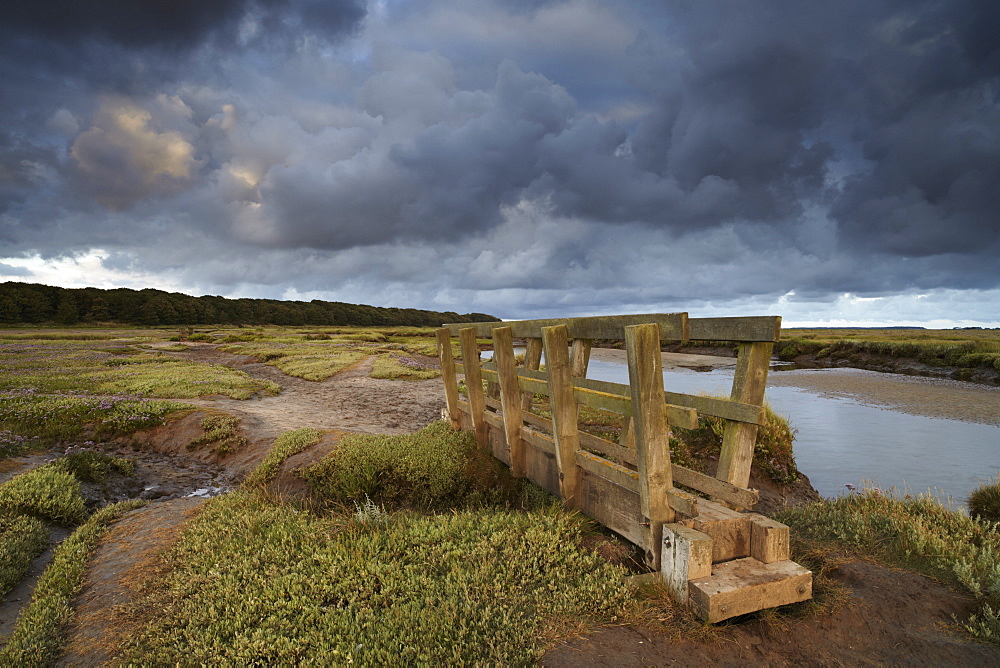 Stromy clouds over the saltmarshes at Stiffkey, Norfolk, England, United Kingdom, Europe