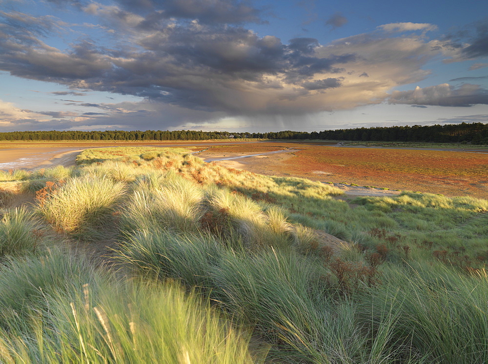 A stormy sky on a late summer evening at Holkham Bay, Norfolk, England, United Kingdom, Europe