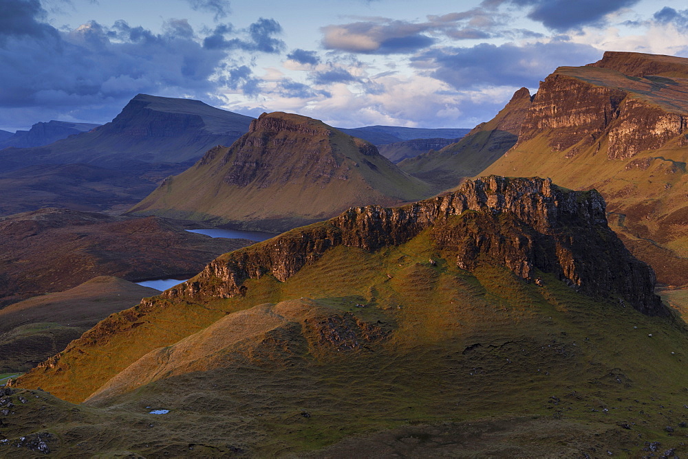 Dramatic early light on the Trotternish ridge as viewed from the Quiraing, Trotternish, Isle of Skye, Scotland, United Kingdom, Europe