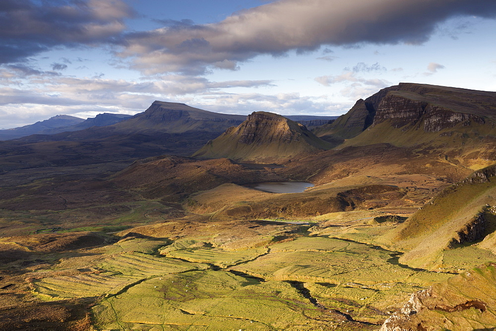 Dramatic early light on the Trotternish ridge as viewed from the Quiraing, Trotternish, Isle of Skye, Scotland, United Kingdom, Europe