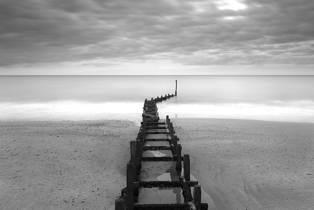 Sea defences on a moody day at Overstrand, Norfolk, England, United Kingdom, Europe