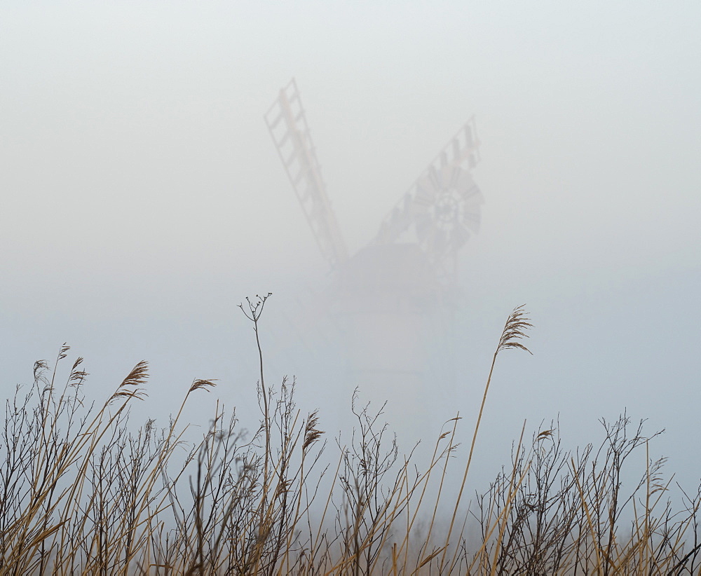 Thurne Mill viewed through the mist at Thurne, Norfolk, England, United Kingdom, Europe