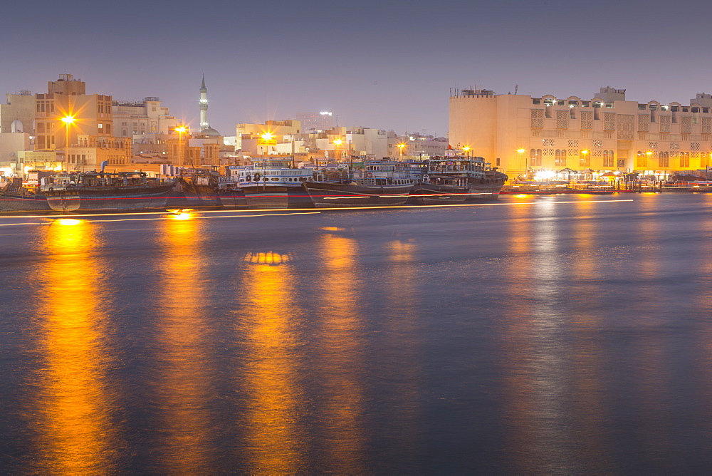 Boats on Dubai Creek at dusk, Bur Dubai, Dubai, United Arab Emirates, Middle East