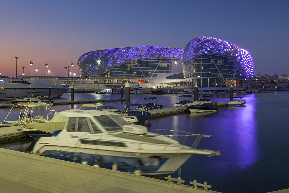 The Yas Viceroy Hotel and Yas Marina at dusk, Yas Island, Abu Dhabi, United Arab Emirates, Middle East