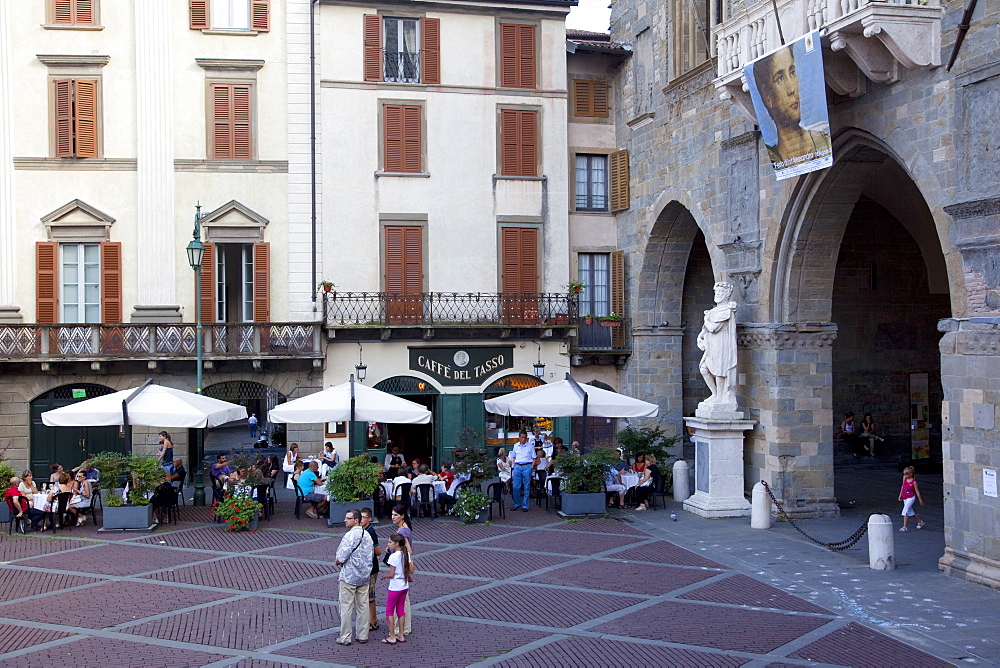 Cafe and statue, Piazza Vecchia, Bergamo, Lombardy, Italy, Europe