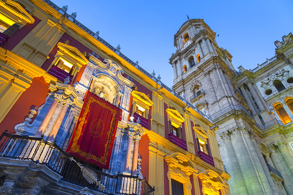 View of Cathedral in Plaza del Obispo at dusk, Malaga, Costa del Sol, Andalusia, Spain, Europe