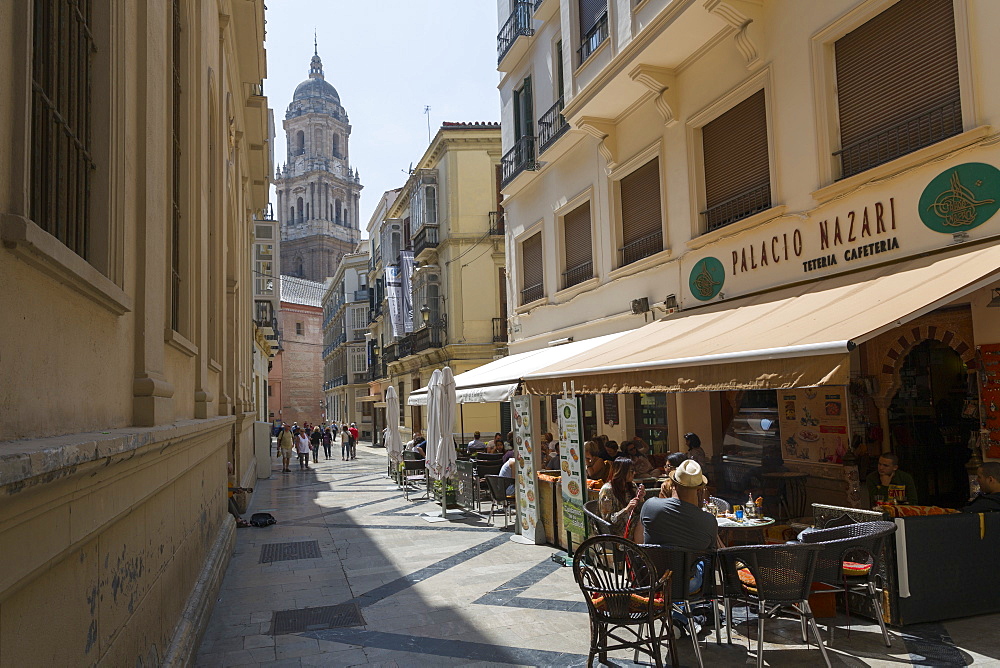 Malaga Cathedral and cafe in narrow street, Malaga, Costa del Sol, Andalusia, Spain, Europe