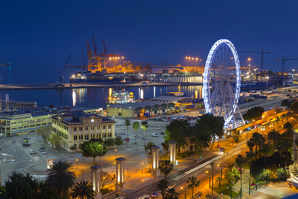 Elevated view of Malaga Marina and ferris wheel at dusk, Malaga, Costa del Sol, Andalusia, Spain, Europe