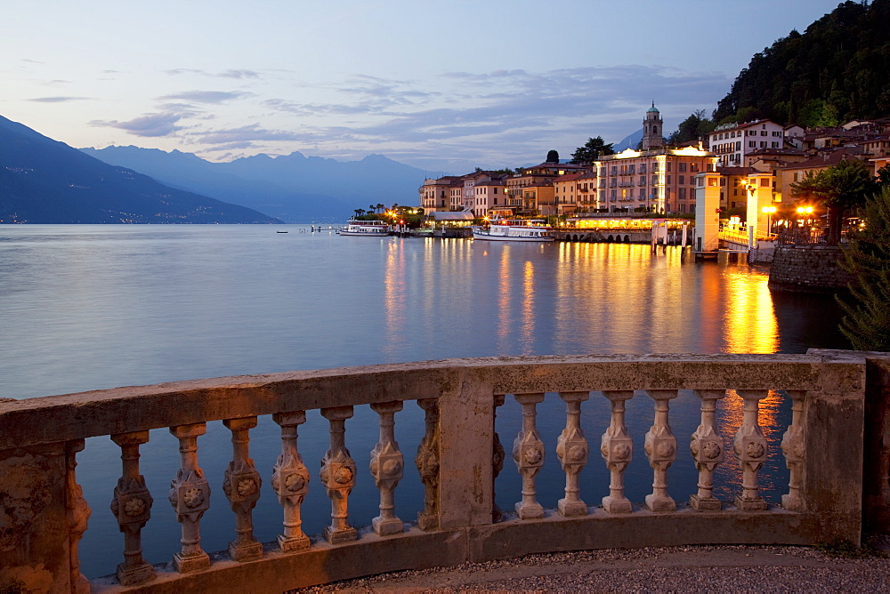 Promenade and lake at dusk, Bellagio, Lake Como, Lombardy, Italian Lakes, Italy, Europe