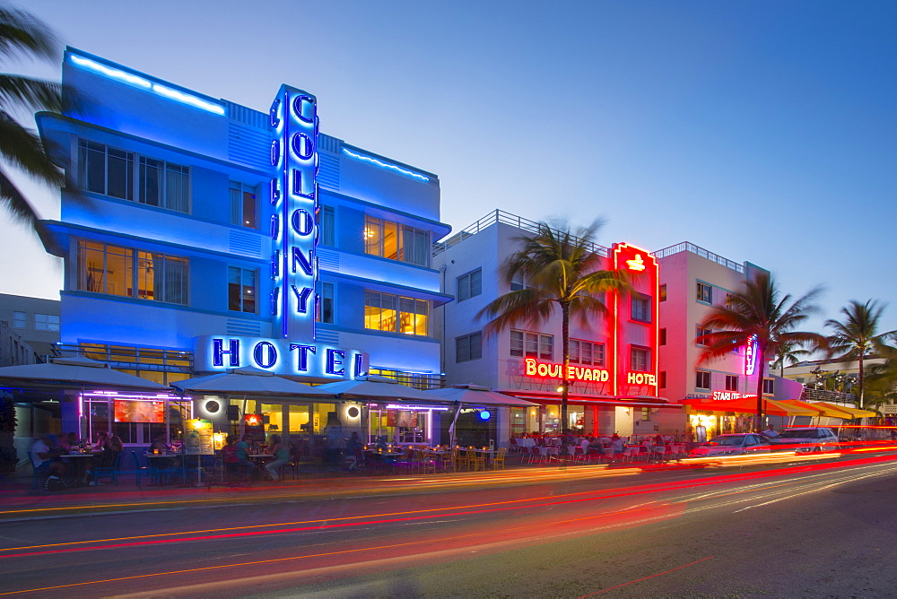 Ocean Drive restaurants and Art Deco architecture at dusk, South Beach, Miami Beach, Miami, Florida, United States of America, North America