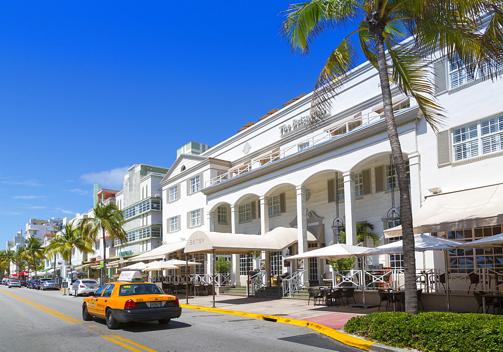 Ocean Drive and Art Deco architecture and yellow cab, Miami Beach, Miami, Florida, United States of America, North America