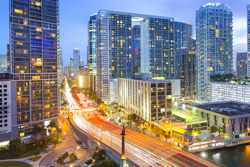 View from Rooftop bar overlooking traffic on Birckell Avenue at dusk, Miami, Florida, United States of America, North America