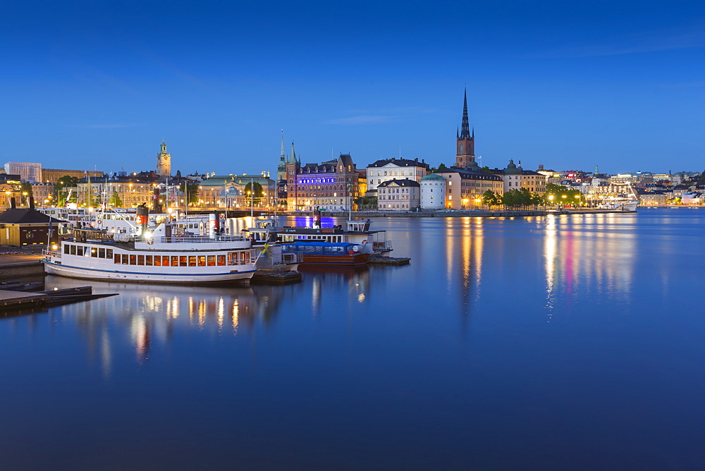 View of Riddarholmen and Sodermalm at dusk from near Town Hall, Stockholm, Sweden, Scandinavia, Europe