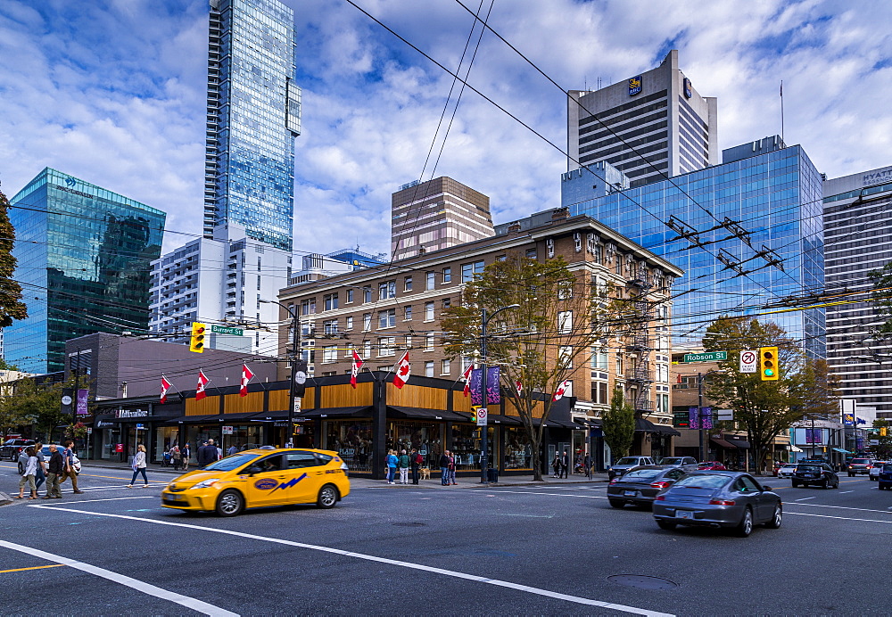 View of traffic and shoppers on Robson Street, Vancouver, British Columbia, Canada, North America