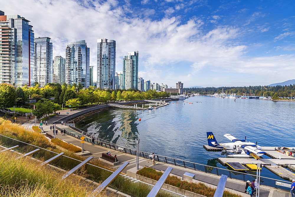 View of seaplane and urban office buildings around Vancouver Harbour, Downtown, Vancouver, British Columbia, Canada, North America