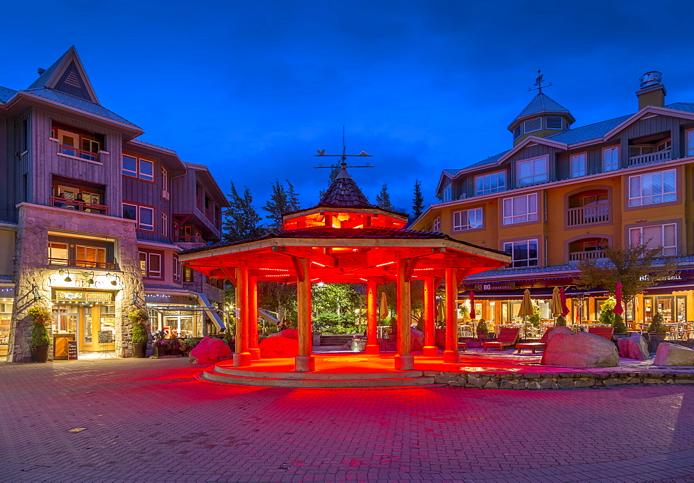 Illuminated bandstand on Village Stroll at dusk, Whistler, British Columbia, Canada, North America