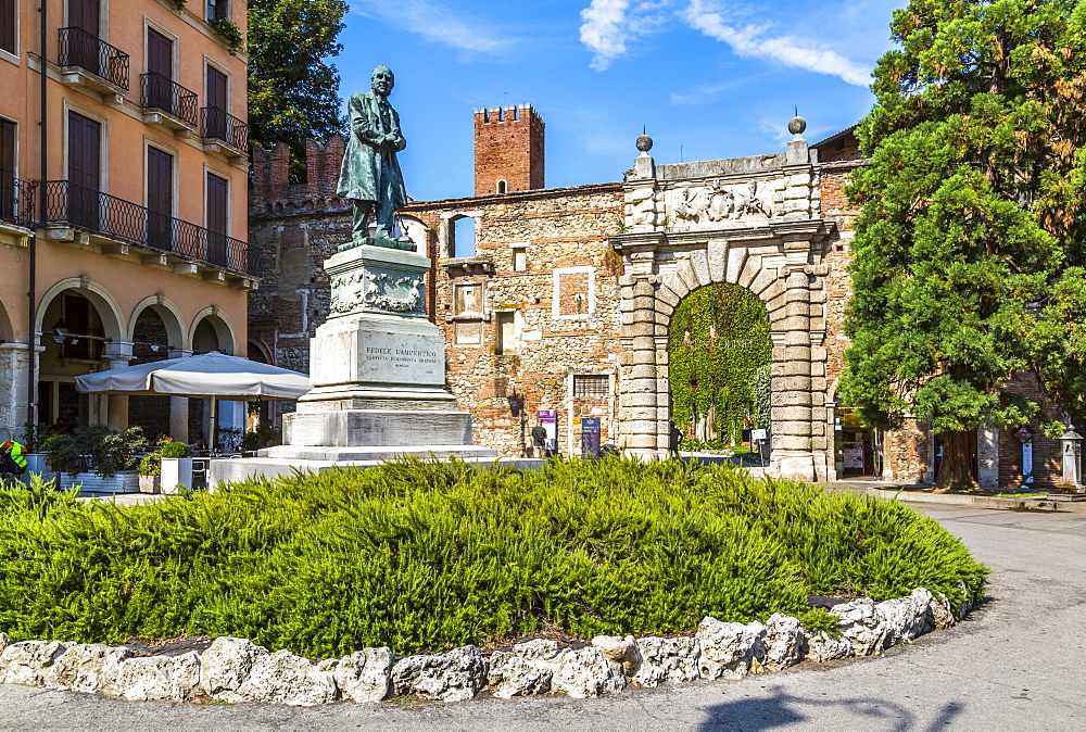 View of entrance to Olympic Theater and statue of Fedele Lampertico, Vicenza, Veneto, Italy, Europe