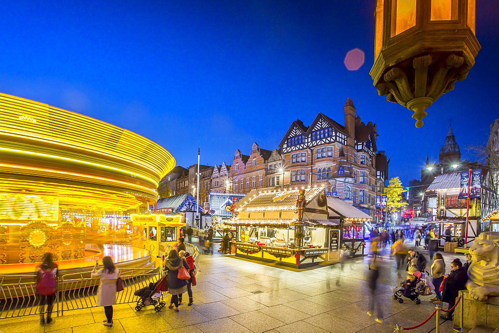 Christmas Market, Carousel and lamp on Old Market Square at dusk, Nottingham, Nottinghamshire, England, United Kingdom, Europe