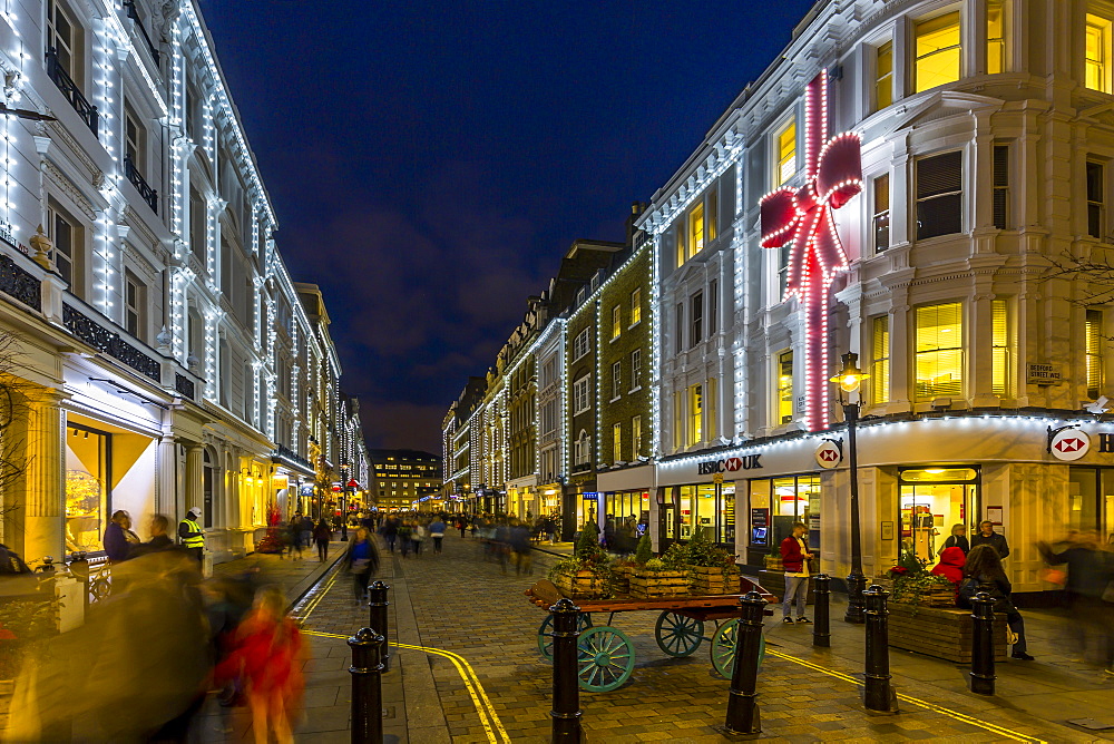 View of Christmas lights adorning Kings Street near Covent Garden at dusk, London, England, United Kingdom, Europe