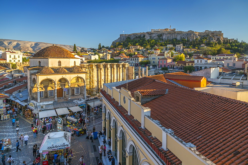 Elevated view of Monastiraki Square with The Acropolis visible in background during late afternoon, Monastiraki District, Athens, Greece, Europe