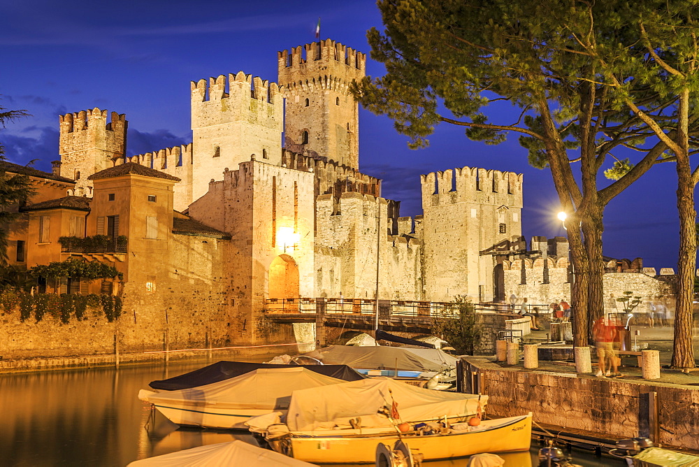 View of Scaliger Castle illuminated at night, Sirmione, Lake Garda, Lombardy, Italian Lakes, Italy, Europe