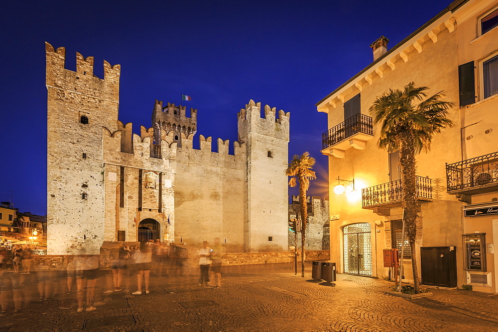 View of Scaliger Castle and Piazza Castello illuminated at night, Sirmione, Lake Garda, Lombardy, Italian Lakes, Italy, Europe