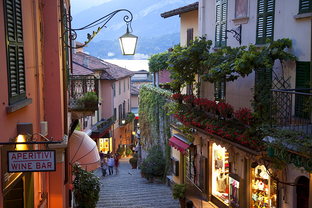 Shopping street at dusk, Bellagio, Lake Como, Lombardy, Italy, Europe