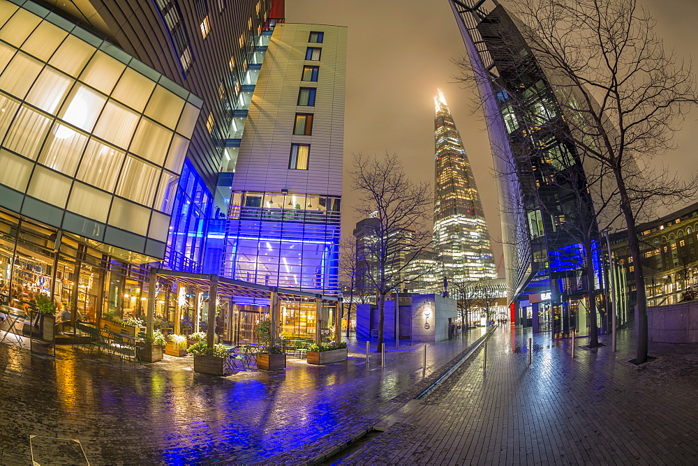 Fisheye view of More London skyline and The Shard visible in background at night, Southwark, London, England, United Kingdom, Europe