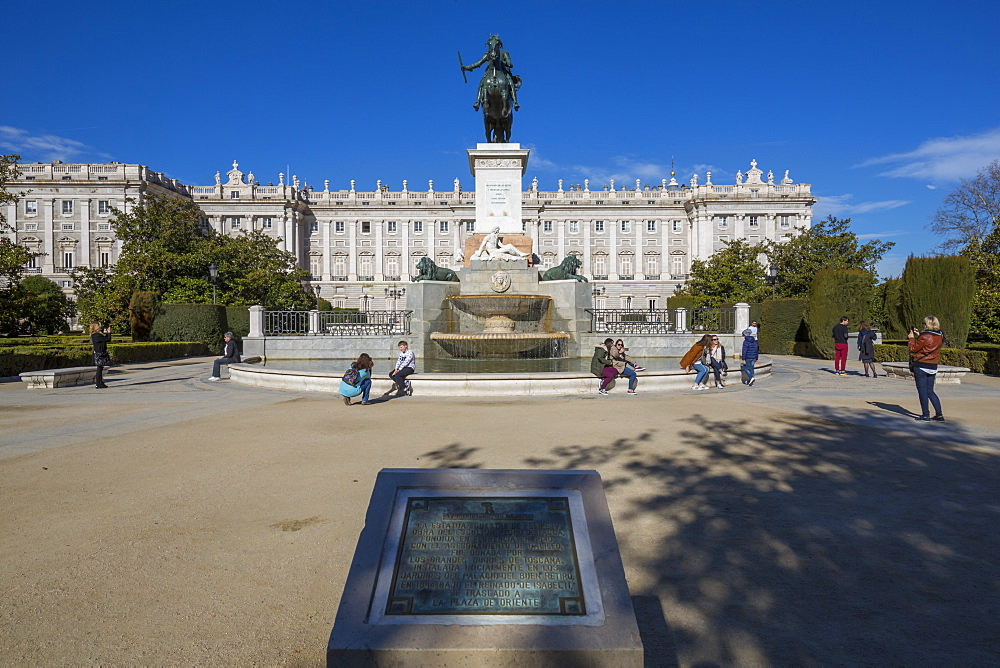 View of Monumento a Felipe IV and Royal Palace on bright sunny morning, Madrid, Spain, Europe