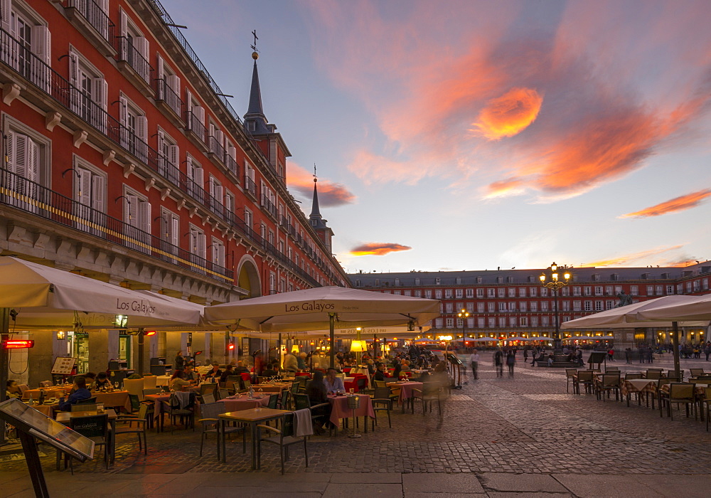 View of restaurants in Plaza Mayor at dusk, Madrid, Spain, Europe