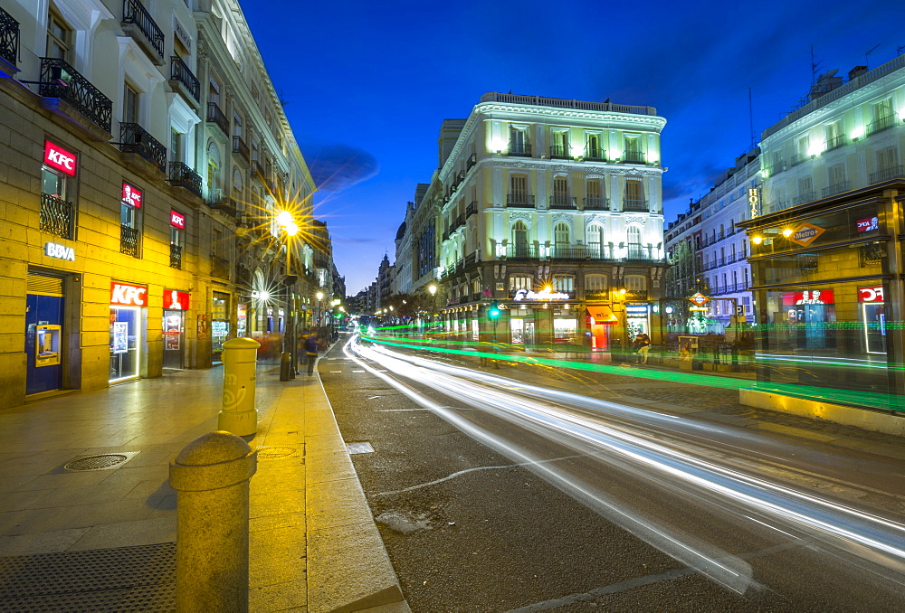 Trail lights and Architecture at Puerta del Sol at dusk, Madrid, Spain, Europe