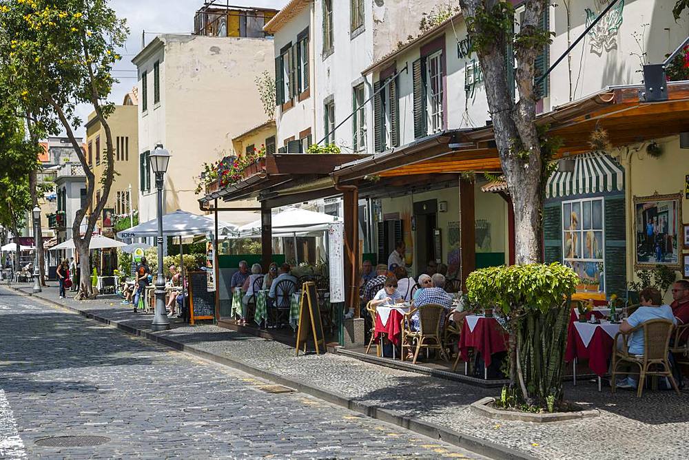 View of cafes and restaurants on old town street, Funchal, Madeira, Portugal, Atlantic, Europe