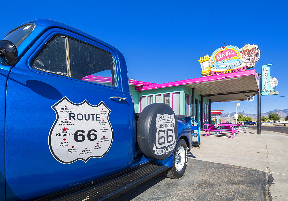 View of vintage station wagon and Mr D'z Diner on Route 66 in Kingman, Arizona, United States of America, North America