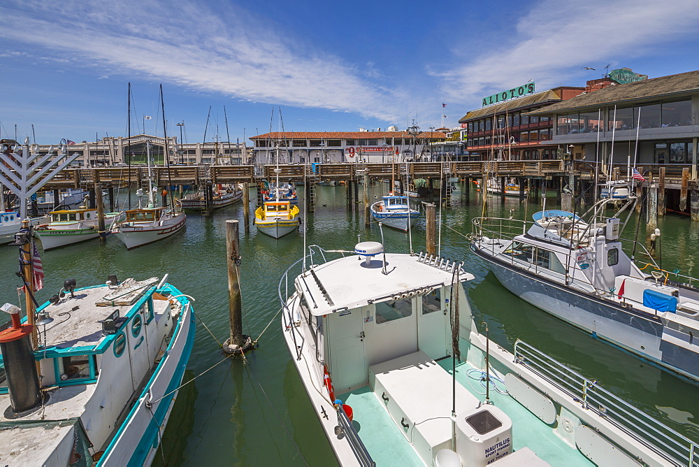 Boats and restaurants in Fishermans Wharf harbour, San Francisco, California, United States of America, North America