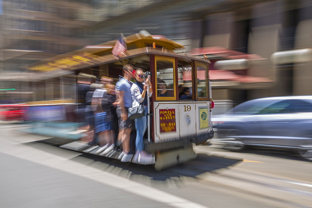 Fast moving cable car in Union Square, San Francisco, California, United States of America, North America