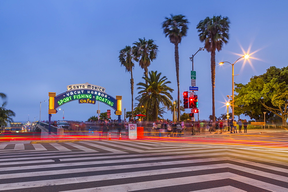 Entrance to Santa Monica Pier at dusk, Santa Monica, Los Angeles, California, United States of America, North America