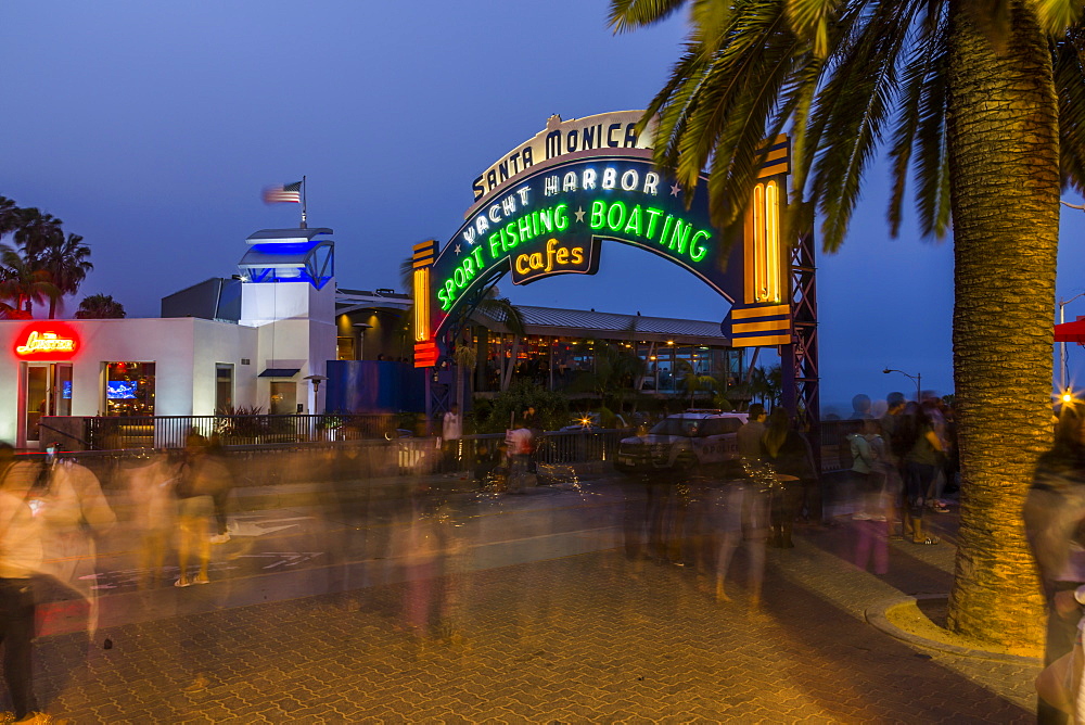 Entrance to Santa Monica Pier at dusk, Santa Monica, Los Angeles, California, United States of America, North America