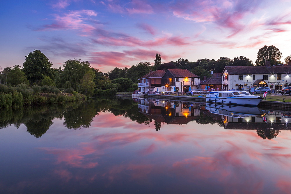 Boats on River Bure at Coltishall after sunset, Norfolk Broads, Norfolk, England, United Kingdom, Europe