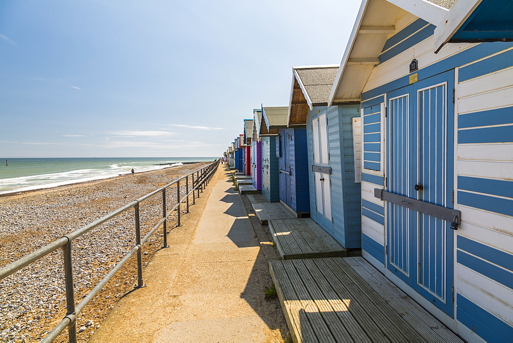 View of colourful beach huts on a summer day, Cromer, Norfolk, England, United Kingdom, Europe