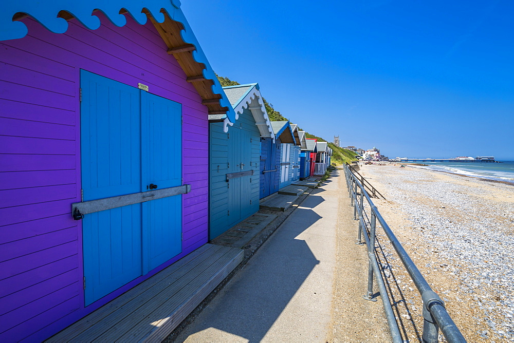 View of colourful beach huts on a summer day, Cromer, Norfolk, England, United Kingdom, Europe