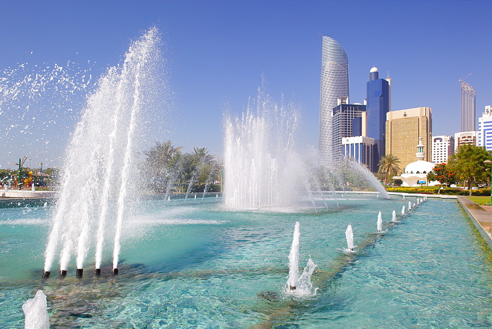 Contemporary architecture and Al Markaziyah Gardens and Fountain, Abu Dhabi, United Arab Emirates, Middle East