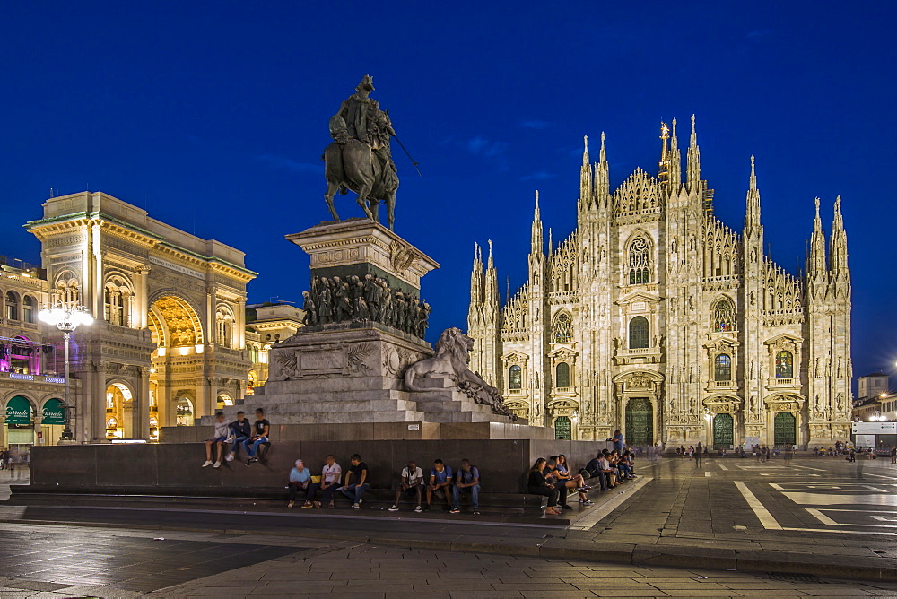 View of Duomo di Milano illuminated in Piazza Del Duomo at dusk, Milan, Lombardy, Italy, Europe