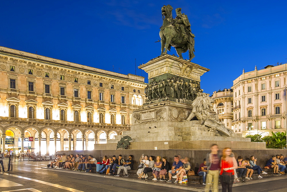 View of statue of Vittorio Emanuele II in Piazza Del Duomo at dusk, Milan, Lombardy, Italy, Europe